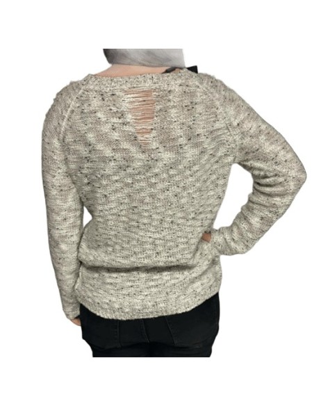 Pull femme blanc brillant avec effet déchiré sur les manches et le dos